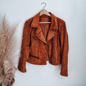 Blank NYC| Faux suede Moto jacket in rust.